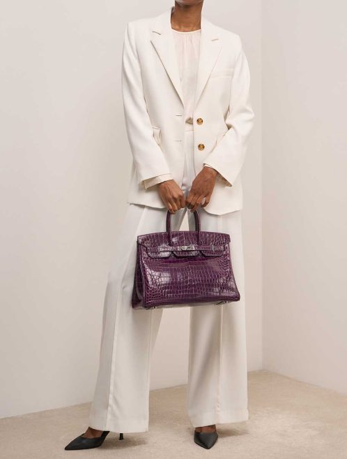 Hermès Birkin 35 Niloticus Crocodile Amethyst on Model | Sell your designer bag