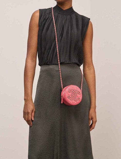 Chanel 19 Round Clutch Lamb Pink on Model | Sell your designer bag