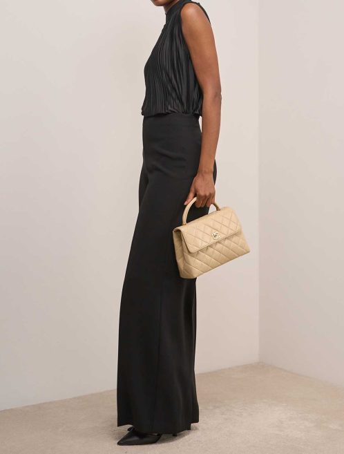 Chanel Timeless Handle Medium Lamb Beige on Model | Sell your designer bag
