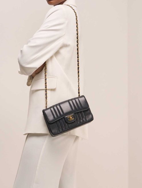 Chanel Timeless Small Lamb Dark Blue on Model | Sell your designer bag