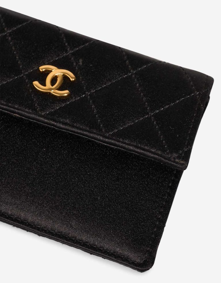 Chanel Timeless Clutch Small Satin Black Signs of wear | Sell your designer bag