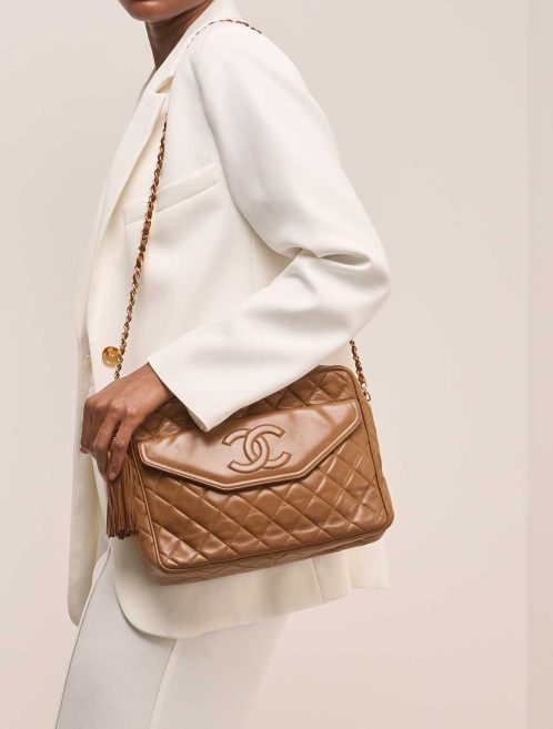 Chanel Camera Bag Large Lamb Brown on Model | Sell your designer bag
