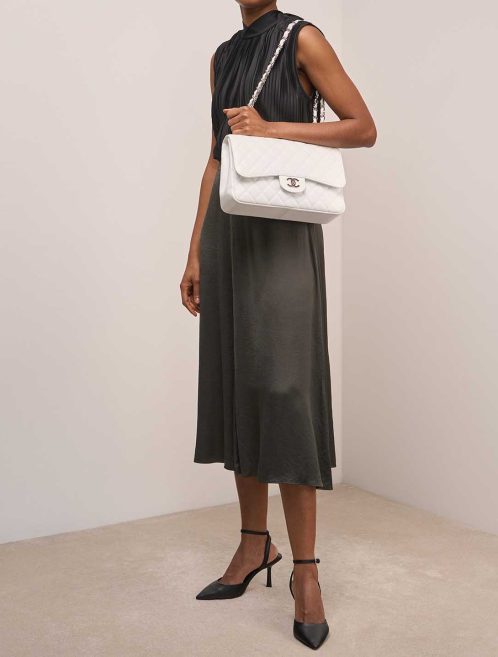Chanel Timeless Jumbo Caviar White on Model | Sell your designer bag