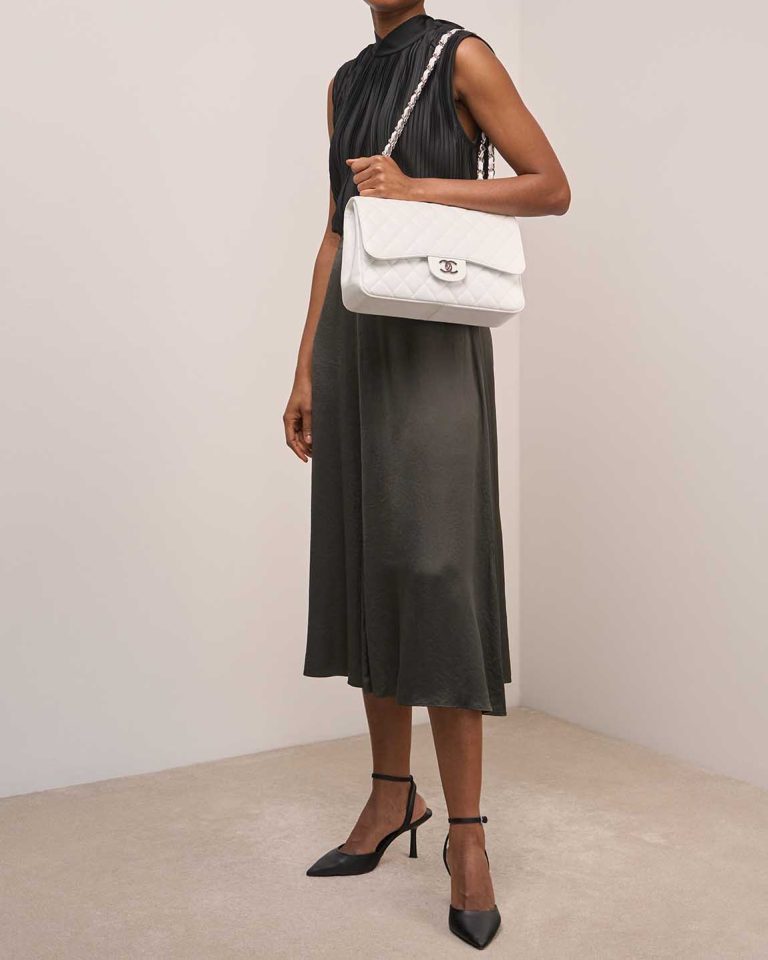 Chanel Timeless Jumbo Caviar White on Model | Sell your designer bag