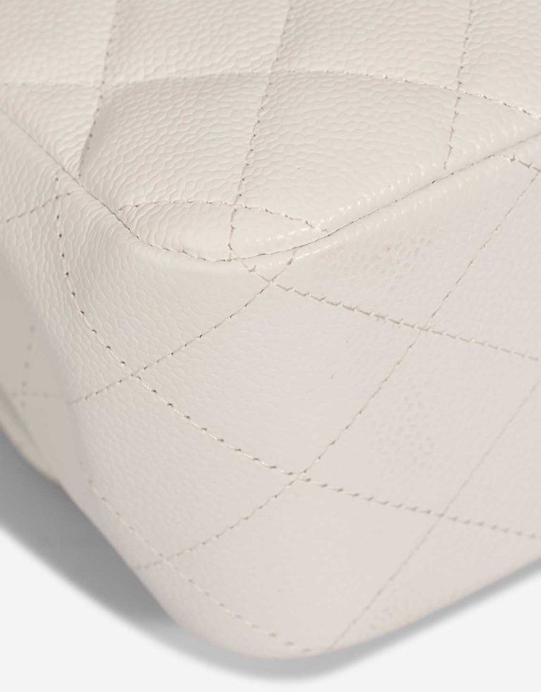 Chanel Timeless Jumbo Caviar White Signs of wear | Sell your designer bag