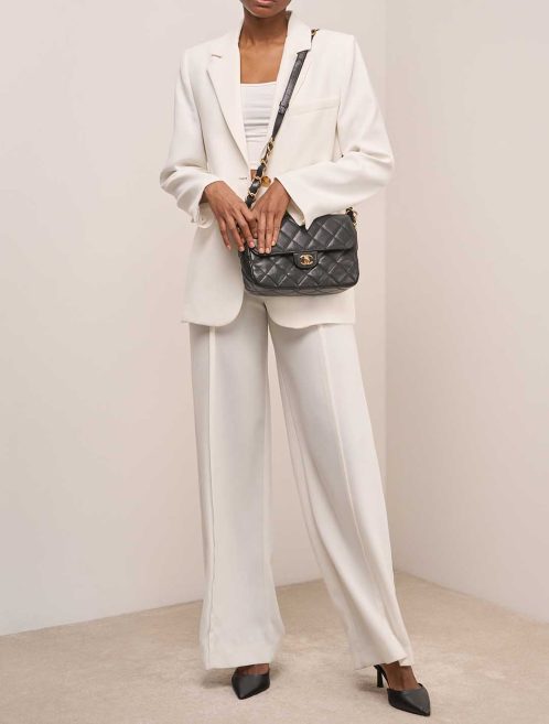 Chanel Timeless Medium Caviar Black on Model | Sell your designer bag