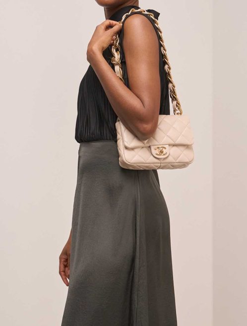 Chanel Timeless Mini Rectangular Lamb Beige on Model | Sell your designer bag