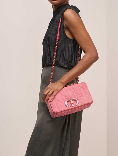 Dior Caro Medium Denim Pink on Model | Sell your designer bag
