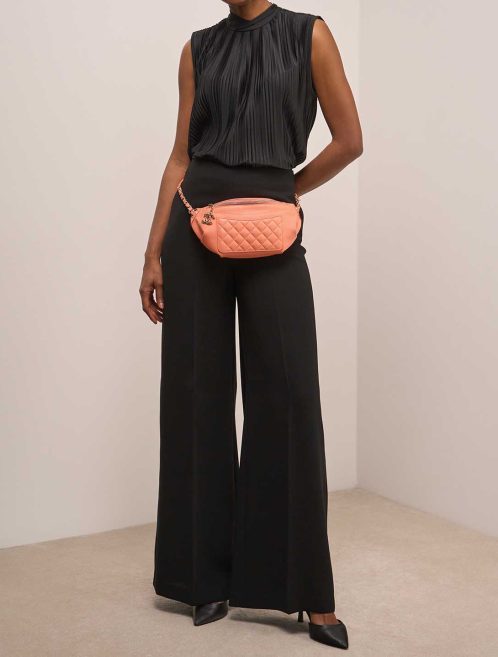 Chanel Timeless Belt Bag Medium Lamb Coral on Model | Sell your designer bag