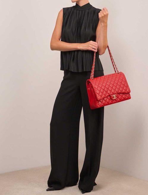Chanel Timeless Maxi Lamb Red on Model | Sell your designer bag