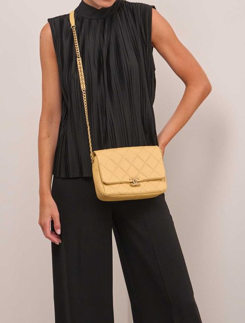 Chanel Timeless Small Caviar Yellow on Model | Sell your designer bag