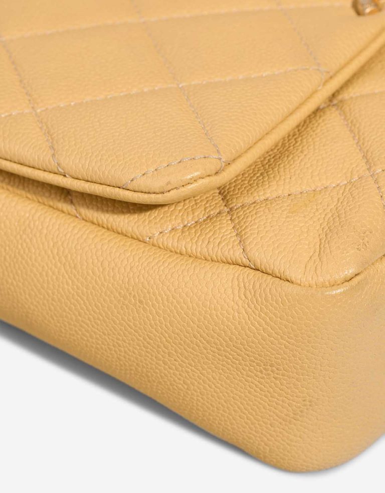 Chanel Timeless Small Caviar Yellow Signs of wear | Sell your designer bag