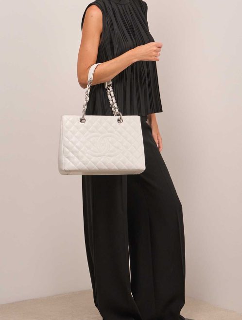 Chanel Shopping Tote GST Caviar White on Model | Sell your designer bag