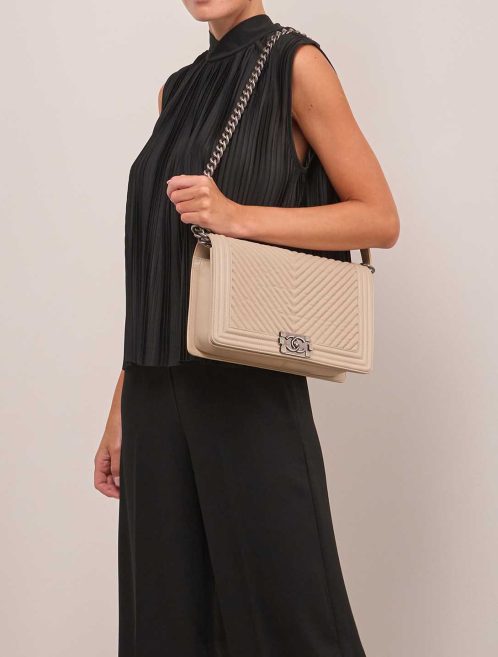 Chanel Boy Large Lamb Beige on Model | Sell your designer bag