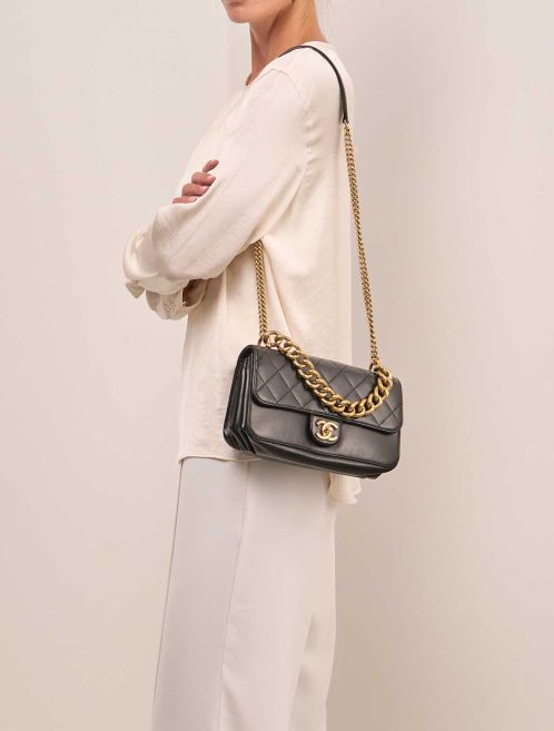 Chanel Around The Corner Flap Bag Medium Calf Black on Model | Sell your designer bag