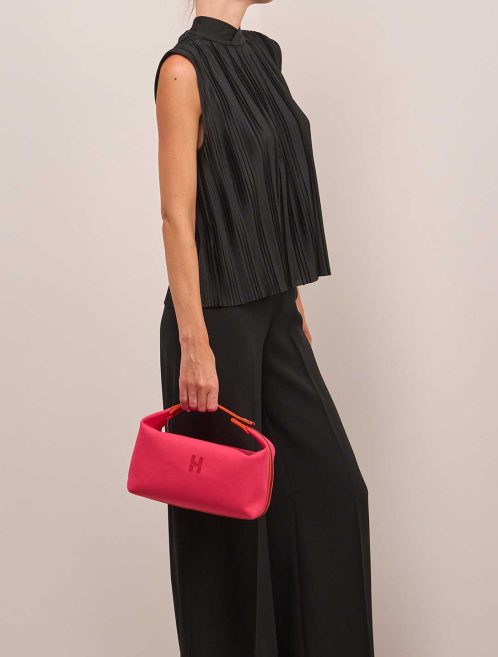 Hermès Bride-à-Brac Wool Rose Extrême / Orange H / Rouge H on Model | Sell your designer bag