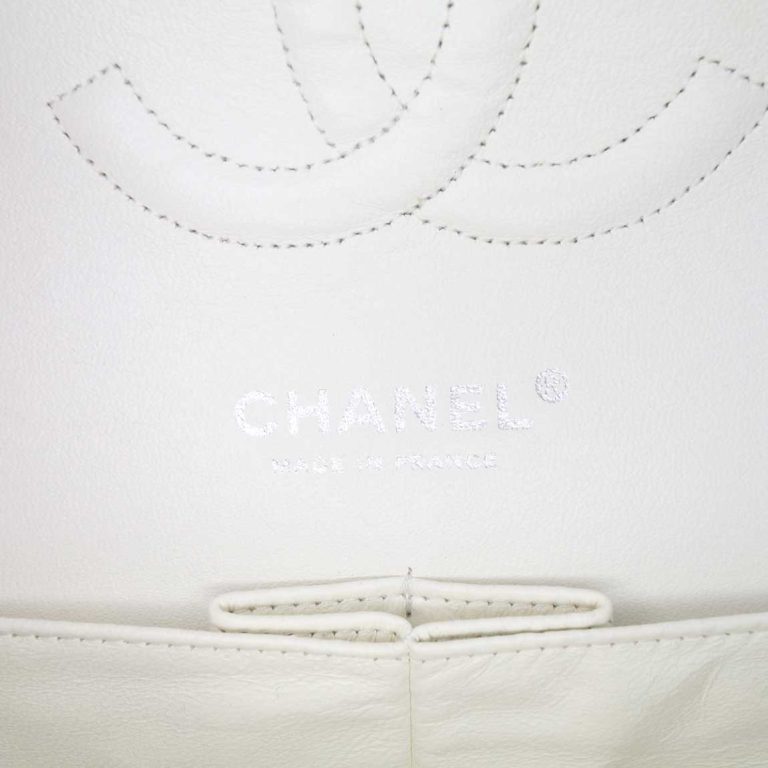 Chanel Timeless Medium Caviar White Logo | Sell your designer bag