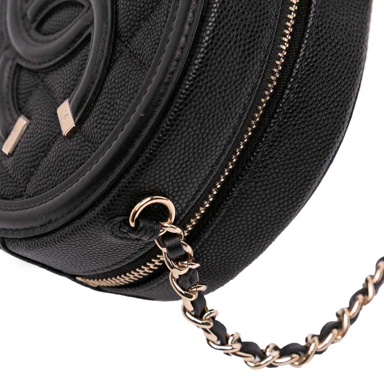 Chanel Filigree Round Clutch Caviar Black Signs of wear | Sell your designer bag