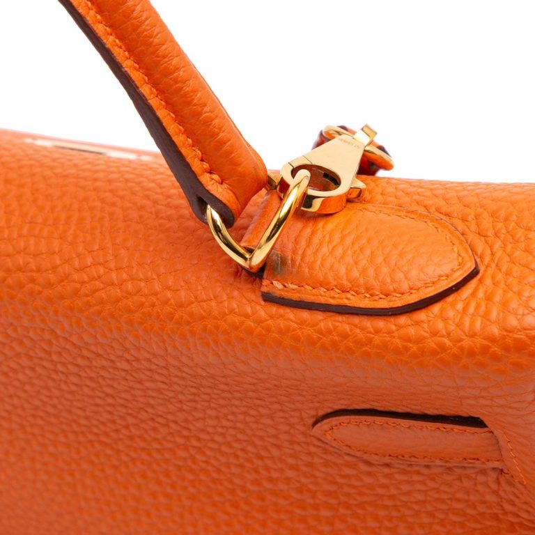 Hermès Kelly 32 Togo Orange H Signs of wear | Sell your designer bag