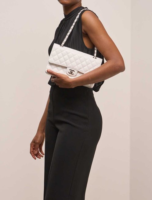 Chanel Timeless Medium Caviar White on Model | Sell your designer bag