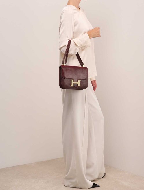 Hermès Constance 23 Lizard Bordeaux on Model | Sell your designer bag
