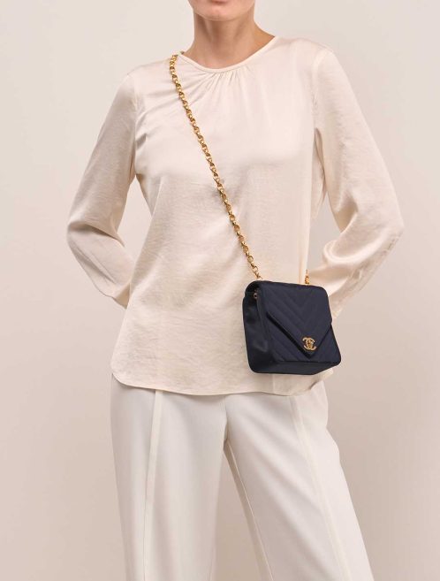 Chanel Timeless Chevron Mini Square Silk Dark Blue on Model | Sell your designer bag