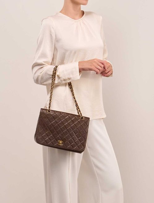 Chanel Flap Bag Medium Lamb Brown on Model | Sell your designer bag