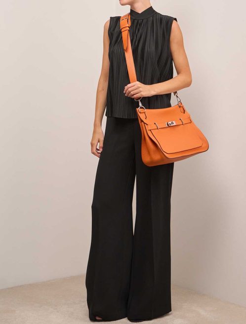 Hermès Jypsière 31 Clémence Orange on Model | Sell your designer bag