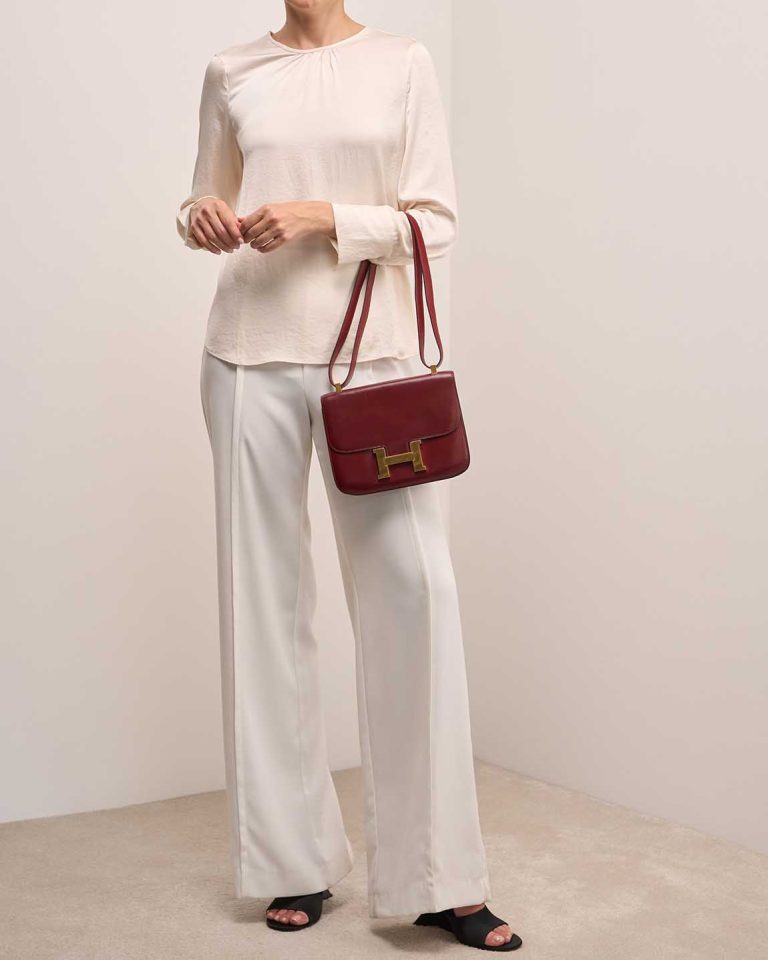 Hermès Constance 24 Box Rouge H on Model | Sell your designer bag