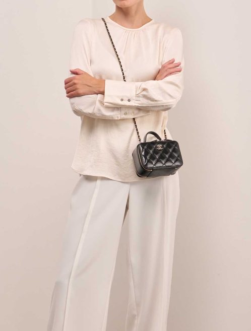 Chanel Vanity Small Patent Black / Rose on Model | Sell your designer bag