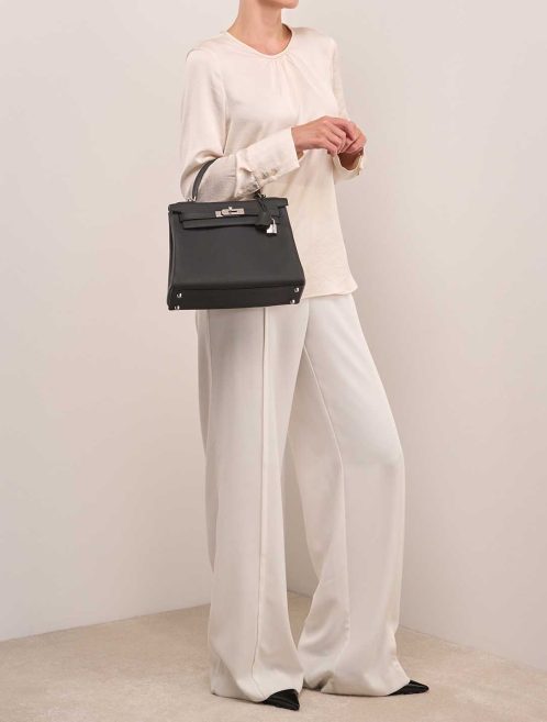 Hermès Kelly 28 Togo Black on Model | Sell your designer bag