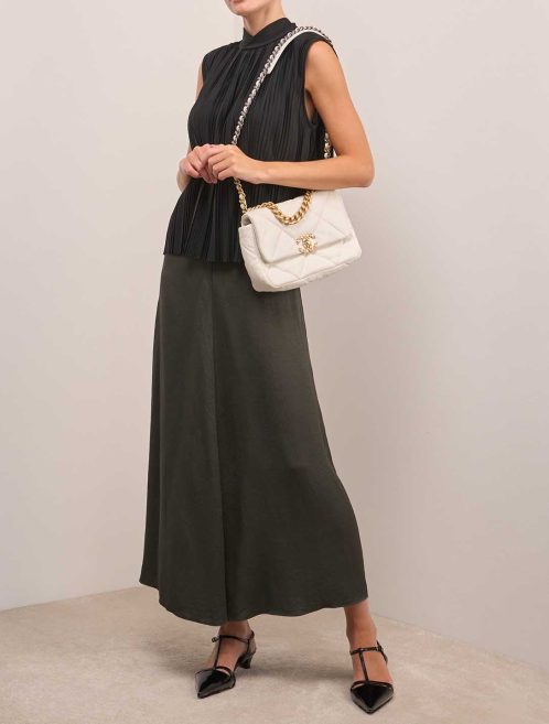 Chanel 19 Flap Bag Lamb White on Model | Sell your designer bag