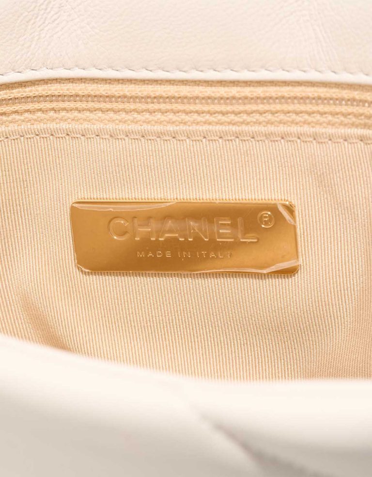 Chanel 19 Flap Bag Lamb White Logo | Sell your designer bag