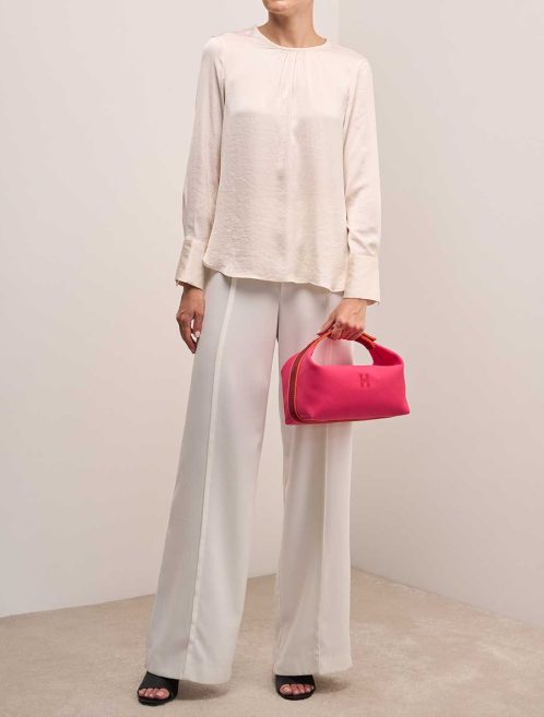 Hermès Bride-à-Brac Canvas Rouge H / Orange H / Hibiscus on Model | Sell your designer bag