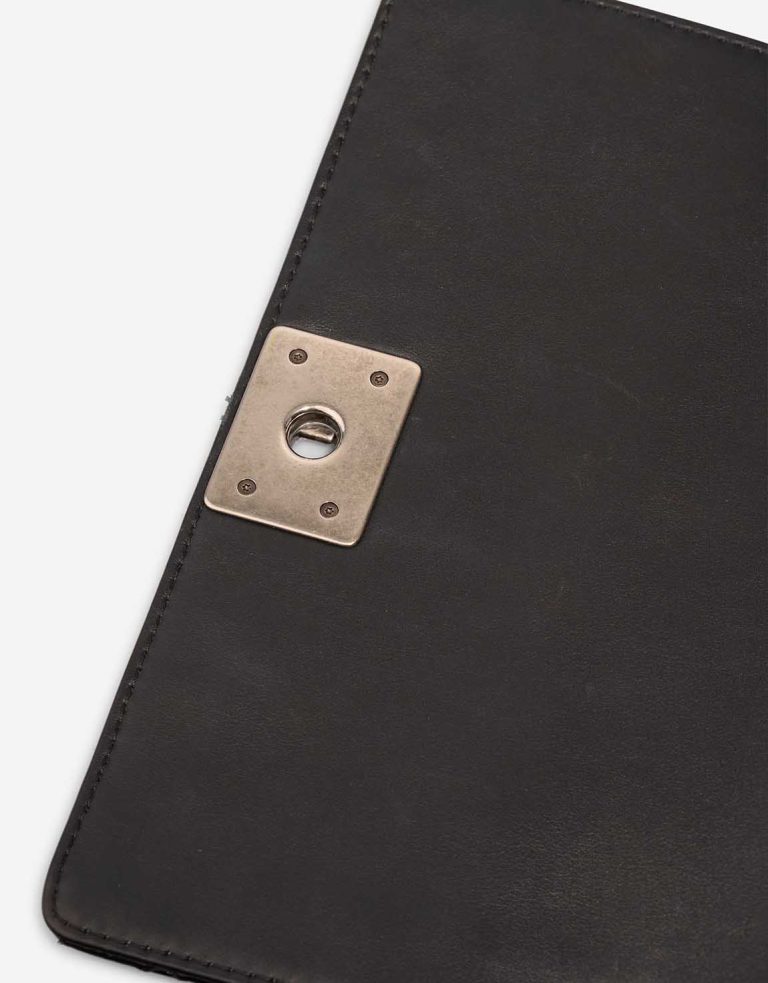Chanel Boy Medium Patent Black Signs of wear | Sell your designer bag