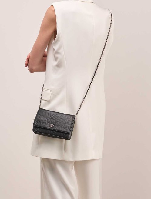 Chanel Timeless Wallet On Chain Lamb Black on Model | Sell your designer bag