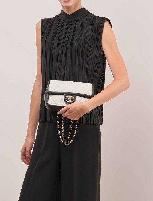 Chanel Timeless Mini Rectangular Lamb Black / White on Model | Sell your designer bag