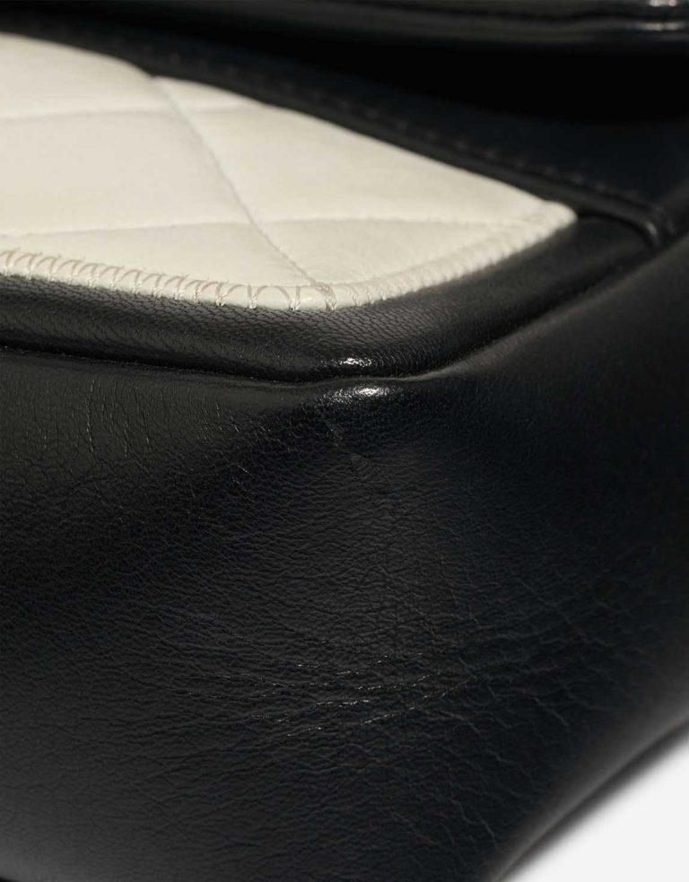 Chanel Timeless Mini Rectangular Lamb Black / White Signs of wear | Sell your designer bag