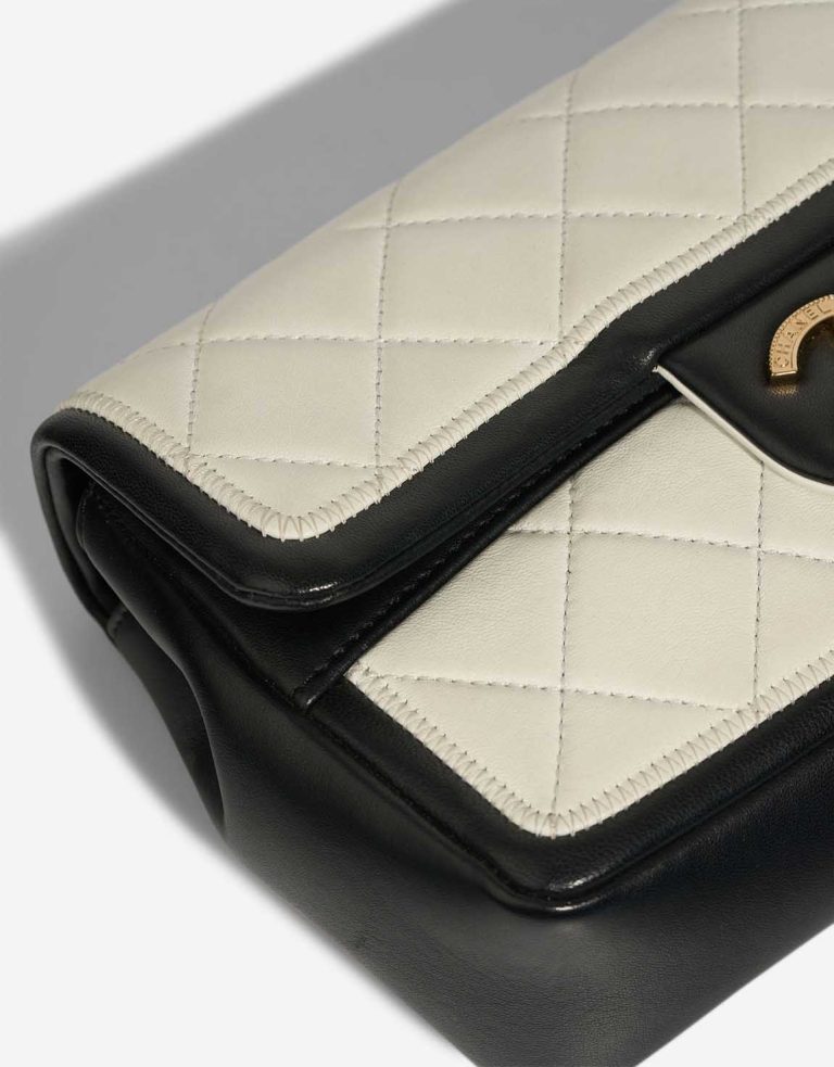 Chanel Timeless Mini Rectangular Lamb Black / White Signs of wear | Sell your designer bag