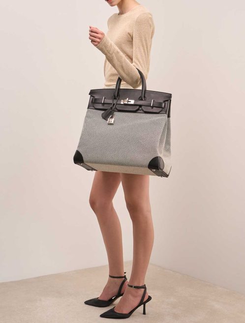 Hermès Haut à Courroies 40 Toile Criss / Veau Evergrain Black / Écru on Model | Sell your designer bag