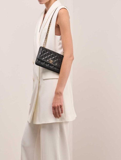 Chanel Timeless Wallet On Chain Lamb Black on Model | Sell your designer bag