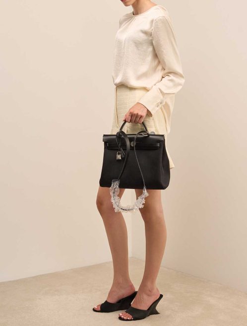 Hermès Herbag 31 Vache Hunter / Toile Black on Model | Sell your designer bag