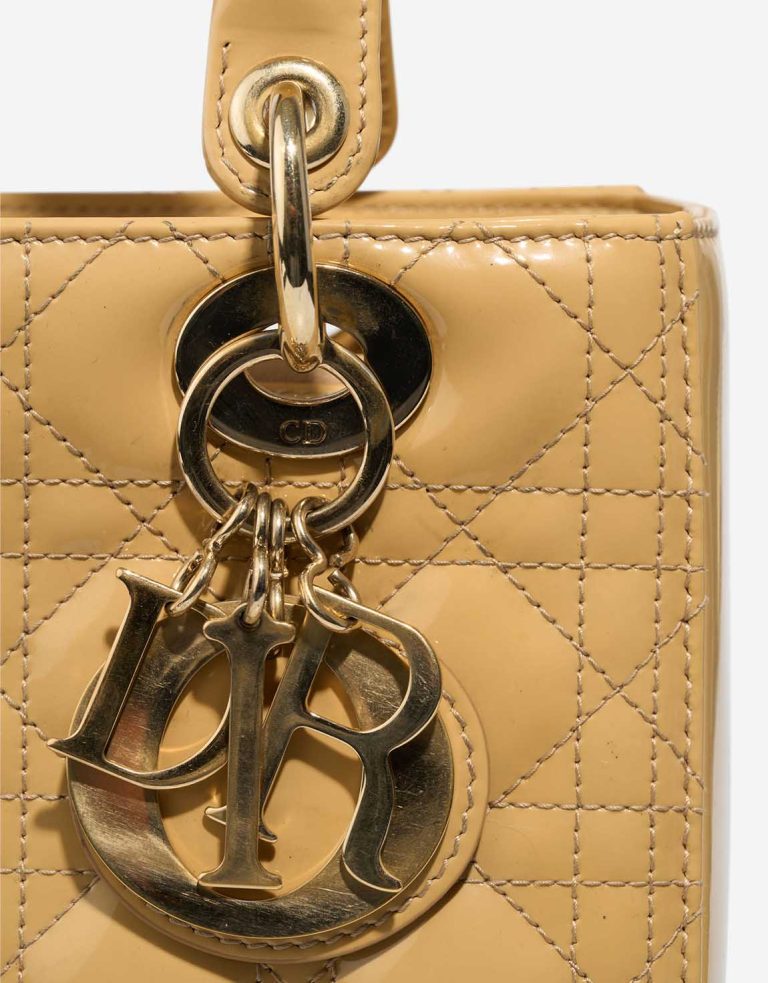 Dior Lady Medium Patent Beige Signs of wear | Sell your designer bag