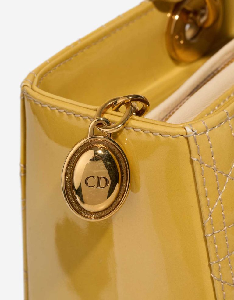 Dior Lady Large Patent Mustard Signs of wear | Sell your designer bag