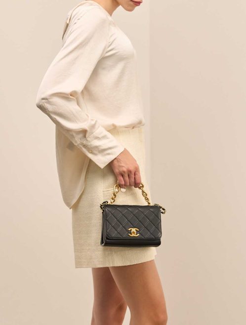 Chanel Flap Bag Mini Rectangular Calf Black on Model | Sell your designer bag