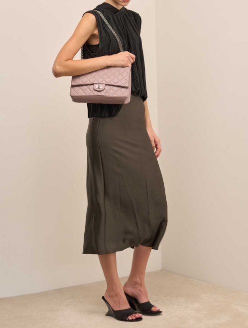 Chanel 2.55 Reissue 226 Aged Calf Light Grey on Model | Sell your designer bag