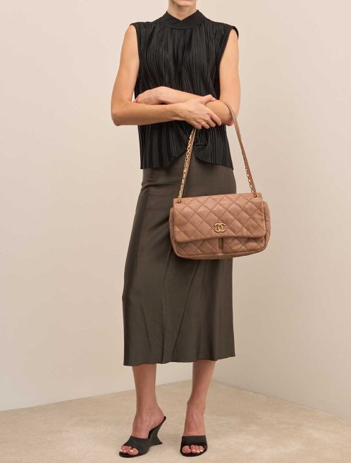 Chanel Timeless Jumbo Calf Beige on Model | Sell your designer bag