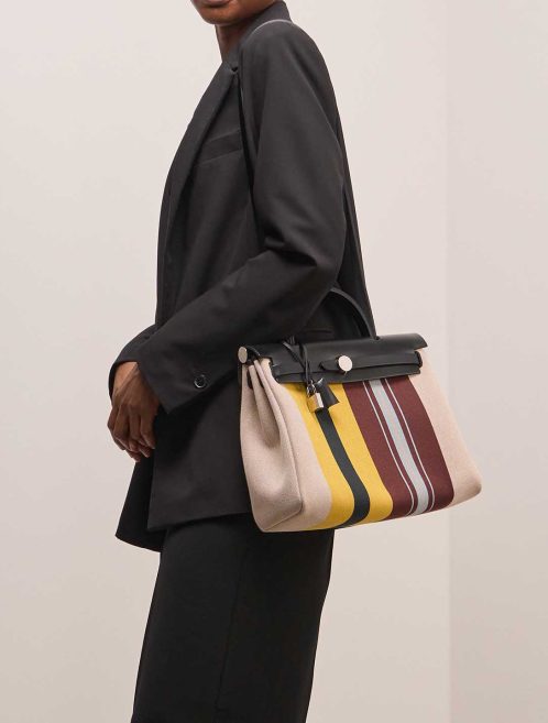 Hermès Herbag 31 Vache Hunter / Toile Écru / Beige / Jaune / Bordeaux / Black on Model | Sell your designer bag