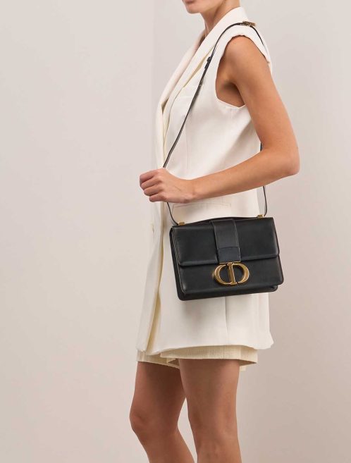 Dior 30 Montaigne Calf Black on Model | Sell your designer bag