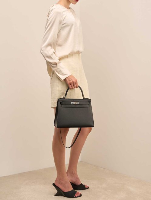Hermès Kelly 28 Epsom Black on Model | Sell your designer bag